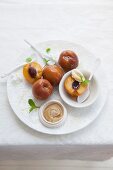 Honey-poached peaches with toffee sauce