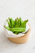 Mange tout in a bamboo basket