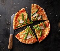 Pizza Margherita with asparagus, rocket and grated Parmesan