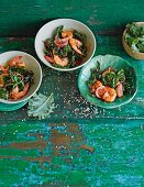 Spicy garlic prawns with chilli flakes, orange zest and green kale