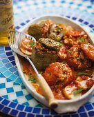 Oven-baked stuffed peppers and stuffed tomatoes