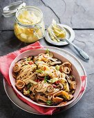 Yakisoba noodles with pickled ginger, mushrooms and pancake rolls (Japan)