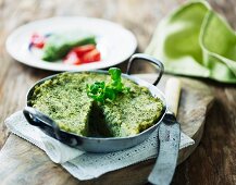 Spinach polenta in an aluminium pan