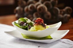 Poppyseed and bacon dumplings with a cold cabbage salad