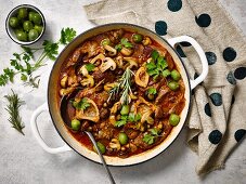 Beef ossobuco with red wine, mushrooms and olives