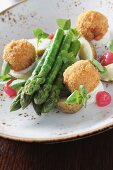 Asparagus with fish balls and potatoes