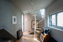 Narrow interior with spiral staircase