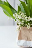 Lily of the valley in paper bag
