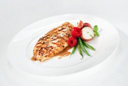 Grilled chicken breast with a raspberry and balsamic sauce