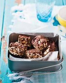 Mint chocolate crispy cakes in a tin