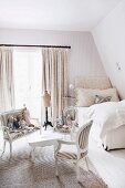 Romantic girl's bedroom with bench and soft toys