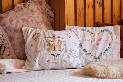 Vintage-style embroidered cushions