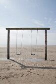 Simple set of swings on beach