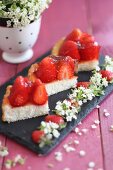 Three slices of strawberry cake with gelatine