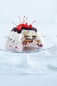 An ice cream bomb with chocolate and cherries for Christmas