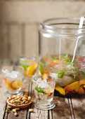 Summer sangria and roasted almonds with garlic and thyme