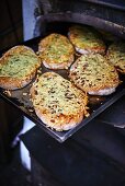 Unleavened bread on a baking tray in an oven