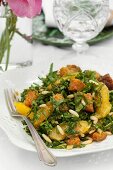 Spinach salad with pine nuts and oranges