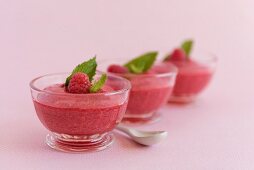 Raspberry mousse in glass bowls