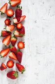 Strawberries on a white surface