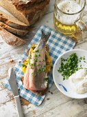 A slice of bread topped with egg, soused herring and horseradish (Northern Germany)