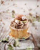 A hedgehog cupcake with chocolate coffee cream