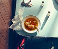Clear broth with matzo dumplings in a diner (USA)