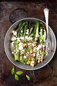 Grilled green asparagus with feta cheese and balsamic vinegar