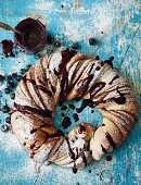 Polish-style bread wreath with cinnamon and blueberry sauce for Easter