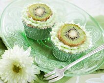Cupcakes decorated with kiwi slices