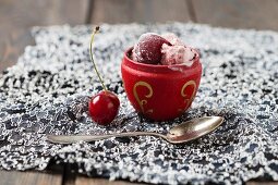 A bowl of homemade cherry ice cream