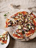 Vegetable pizza with courgettes and sardines in oil
