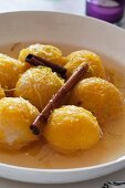 Candied yellow plums in a spicy broth