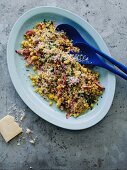Quinoa and corn salad with bacon and hazelnuts