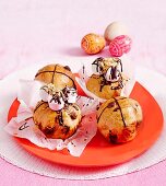 Sweet chocolate brioches with chocolate cross and marshmallows