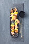 Tuna and mango skewers with spring onions