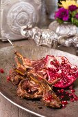 Korma lamb chops with pomegranate seeds