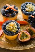 Mini cheesecakes with blueberries and passion fruit