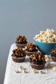 Chocolate cupcakes with caramelised popcorn