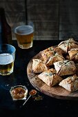 Pork and apple pies with chutney and beer
