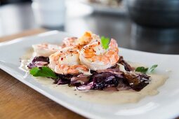 Scampi on a radicchio salad with a Gorgonzola sauce