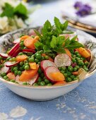 Pea and carrot salad with radishes and a mint dressing