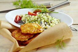 Herring salad with potato fritters