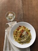 Pasta with pistachio pesto and crispy bacon