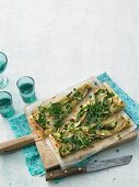 Puff pastry pizza with green vegetables