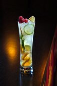 A ginger cocktail with oranges and cucumber at a bar (Buddha-Bar Hotel, Paris)