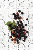 Blackberries on a lace surface