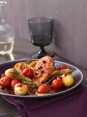 Tuscan chicken bake with potatoes and cherry tomatoes