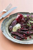 Ostrich fillet with pomegranate dressing