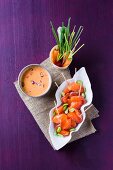 Vegetables and meat skewers with a dip, Asia